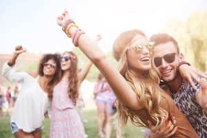 Friends attending a music festival