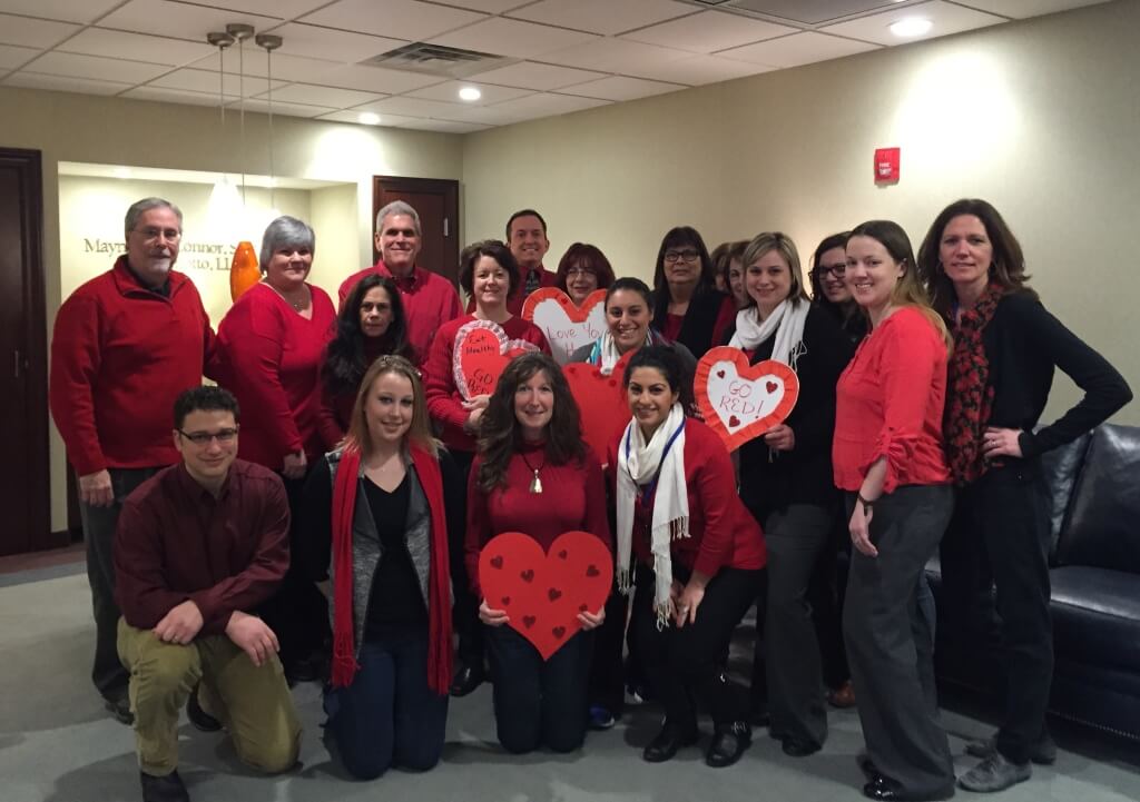 Maynard, O’Connor, Smith & Catalinotto, LLP team all wearing red